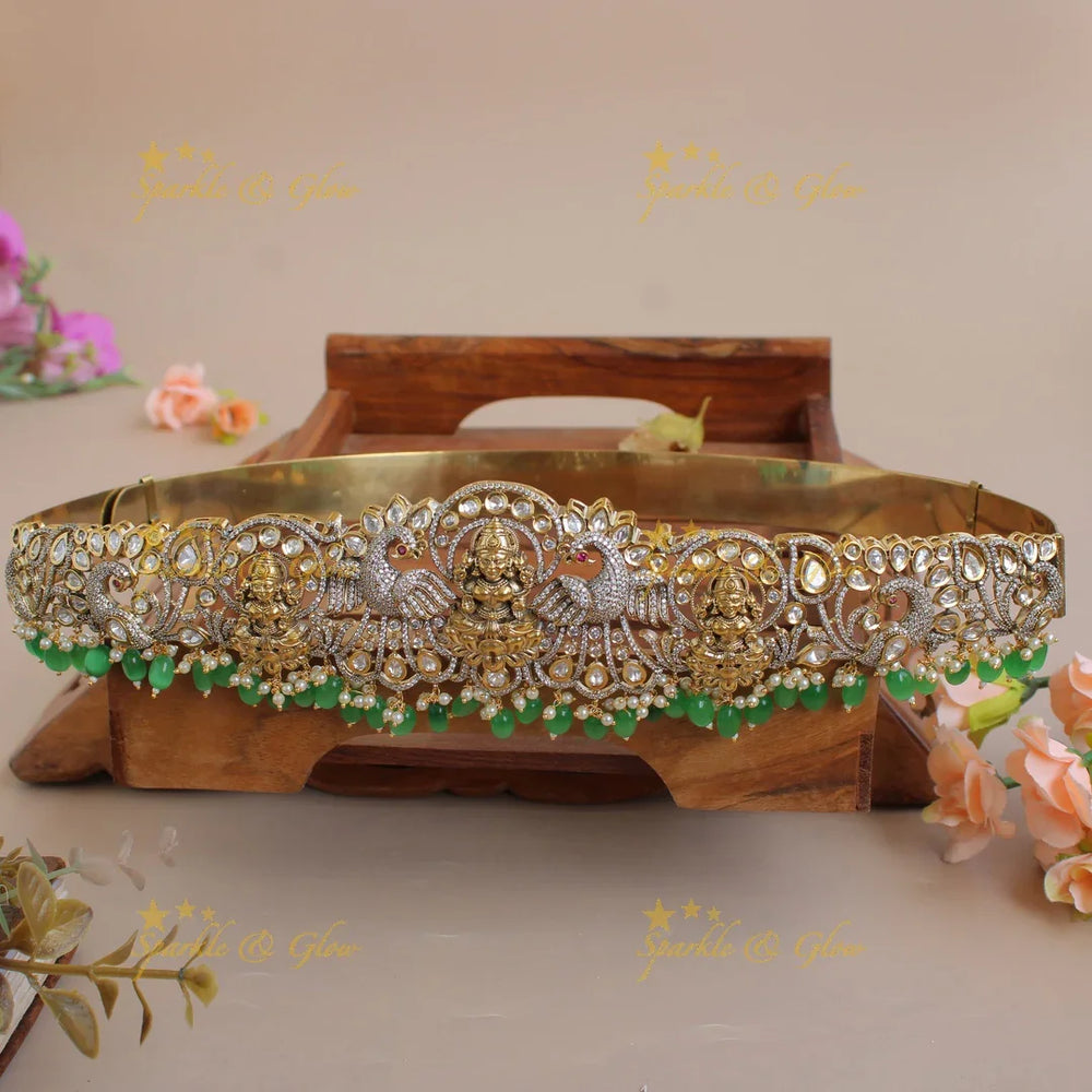 Exclusive Lakshmi peacock carved silver and gold finish victorian ad hipbelt with pearls and baby pink beads - Sparkle and Glow