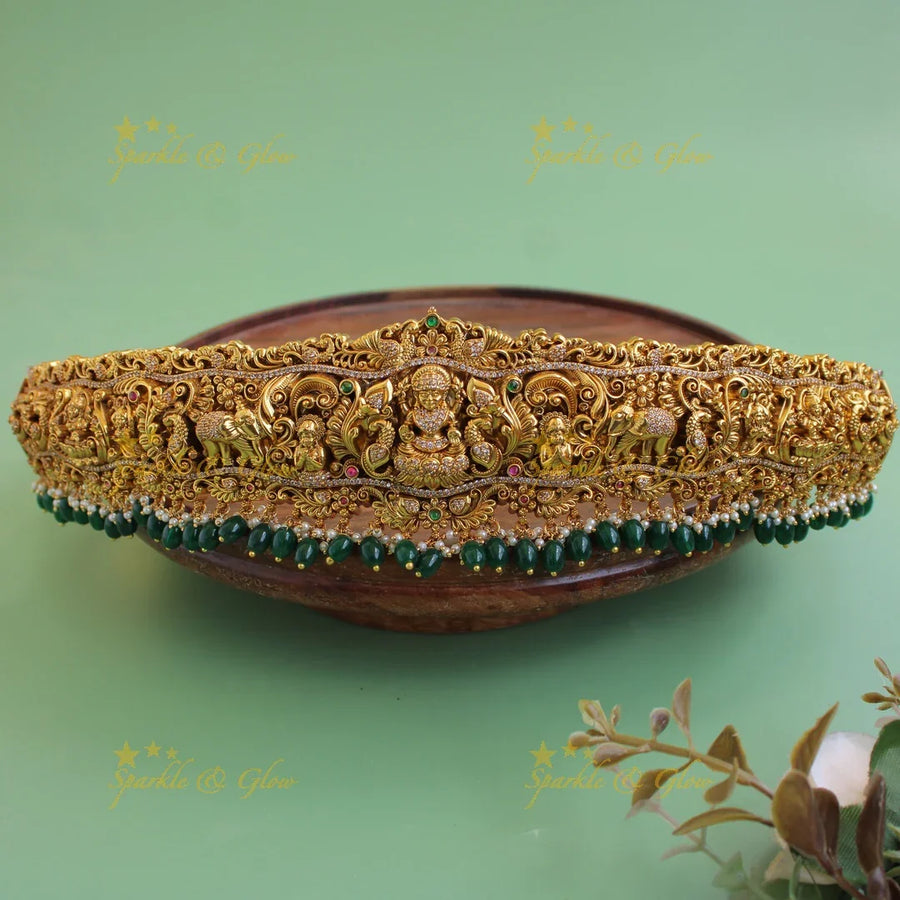 Grand intricate Lakshmi elephant peacock carved hipbelt with stones and green beads - Sparkle and Glow