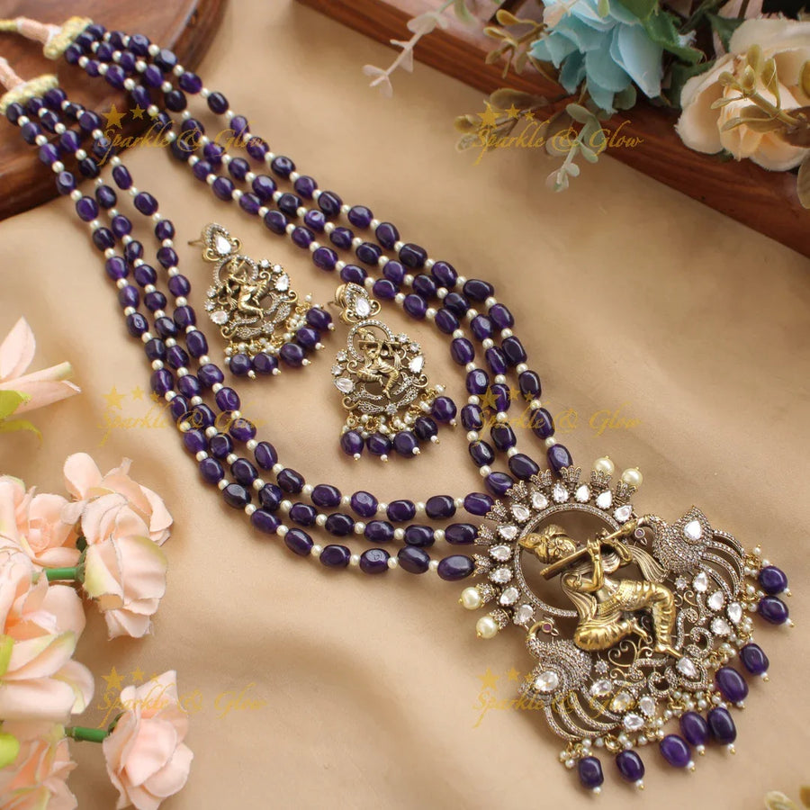 Statement Krishna playing flute peacock design pendant Victorian AD haram with multi layer beads chain - blue - Sparkle and Glow