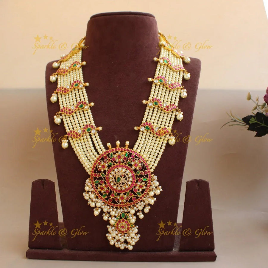 Exclusive Peacock floral design pendant jadau Rani haram with multi layer pearl chain - Sparkle and Glow