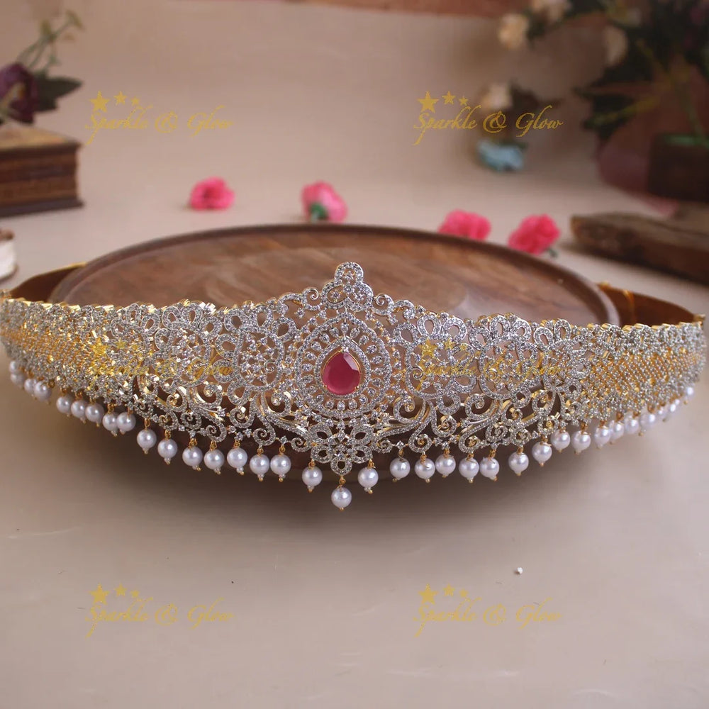 Glittering Floral and branch design American diamond hipbelt with emerald in centre and pearl drops - Sparkle and Glow