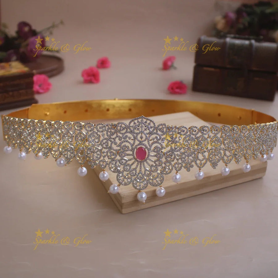 Sparkling Floral design American diamond hipbelt with emerald in centre and pearl drops - Sparkle and Glow