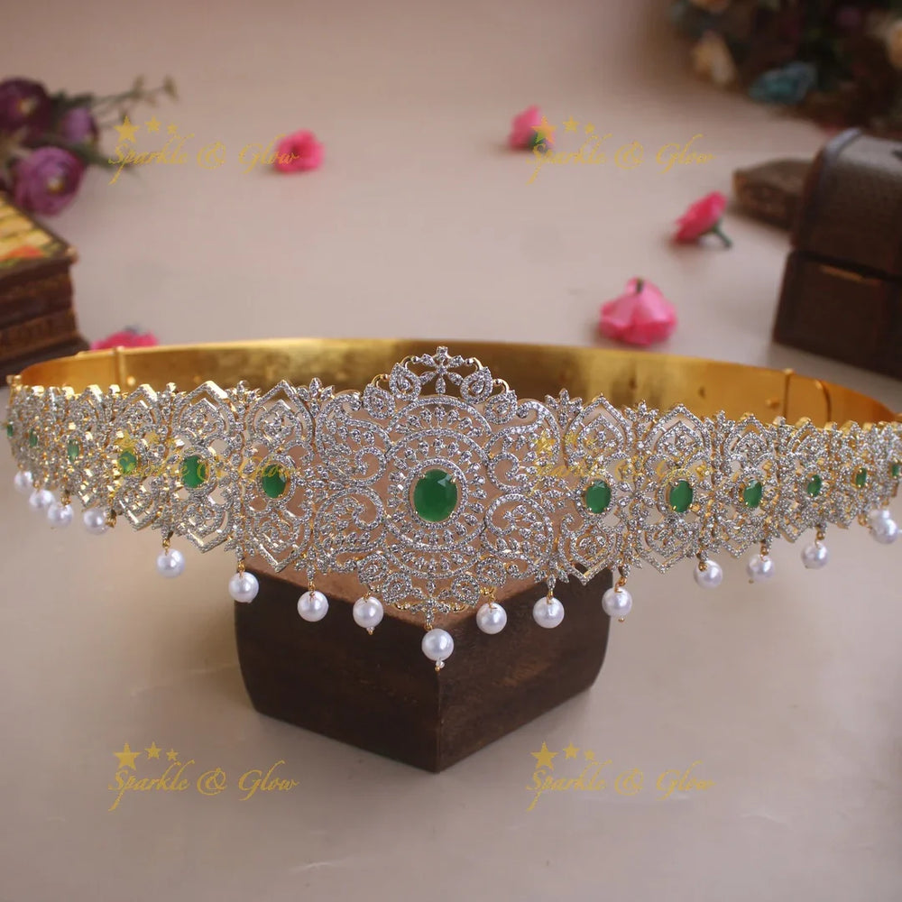 Statement Leaf design American diamond hipbelt with emerald and pearl drops - Sparkle and Glow