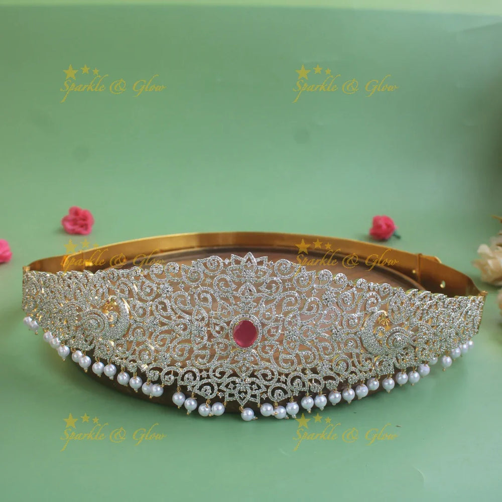 Beautiful Peacock floral design American diamond hipbelt with emerald and pearl drops - Sparkle and Glow