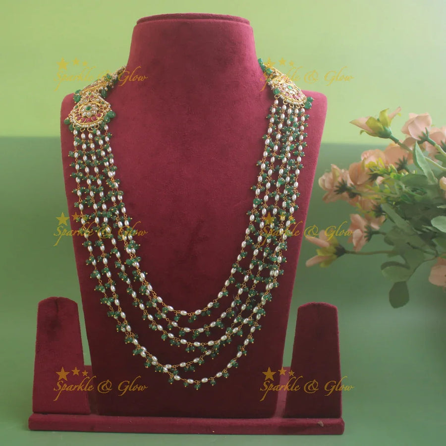 Statement Floral peacock design jadau haram with multi layer pearl and green beads chain - Sparkle and Glow