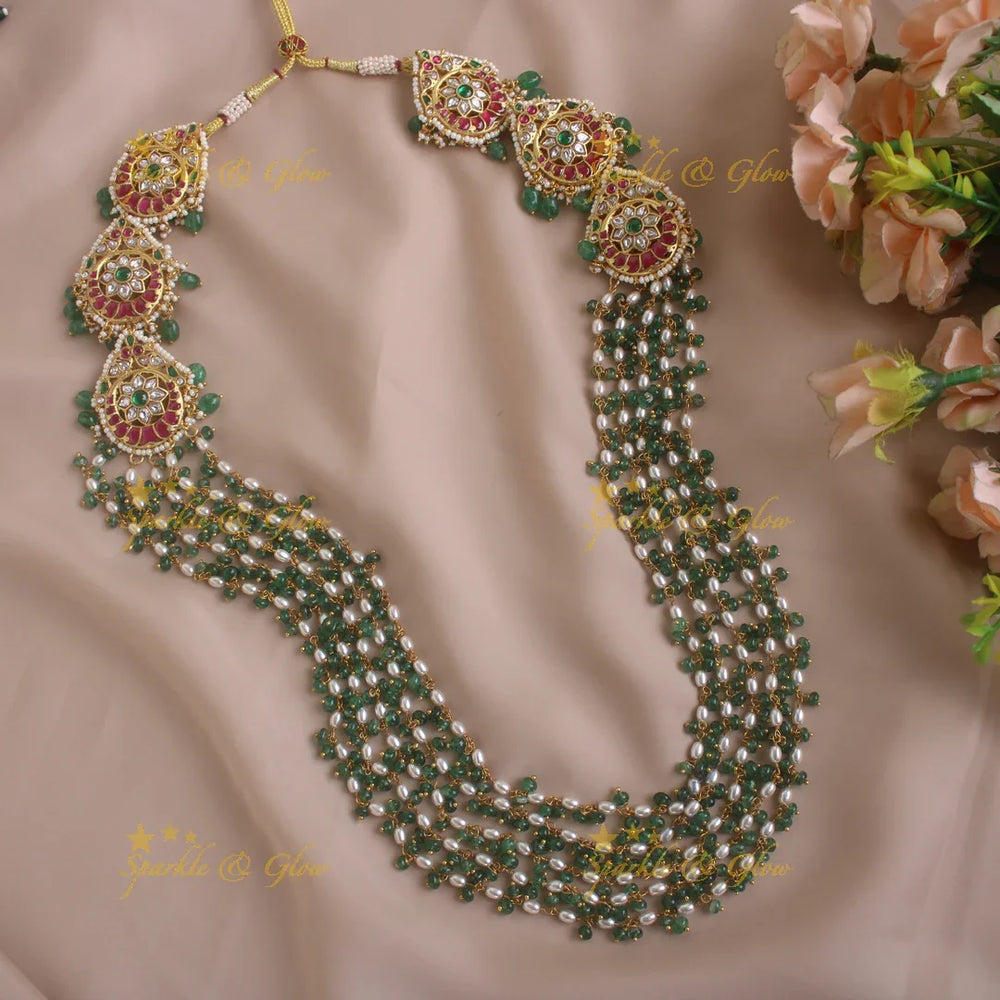 Statement Floral peacock design jadau haram with multi layer pearl and green beads chain - Sparkle and Glow