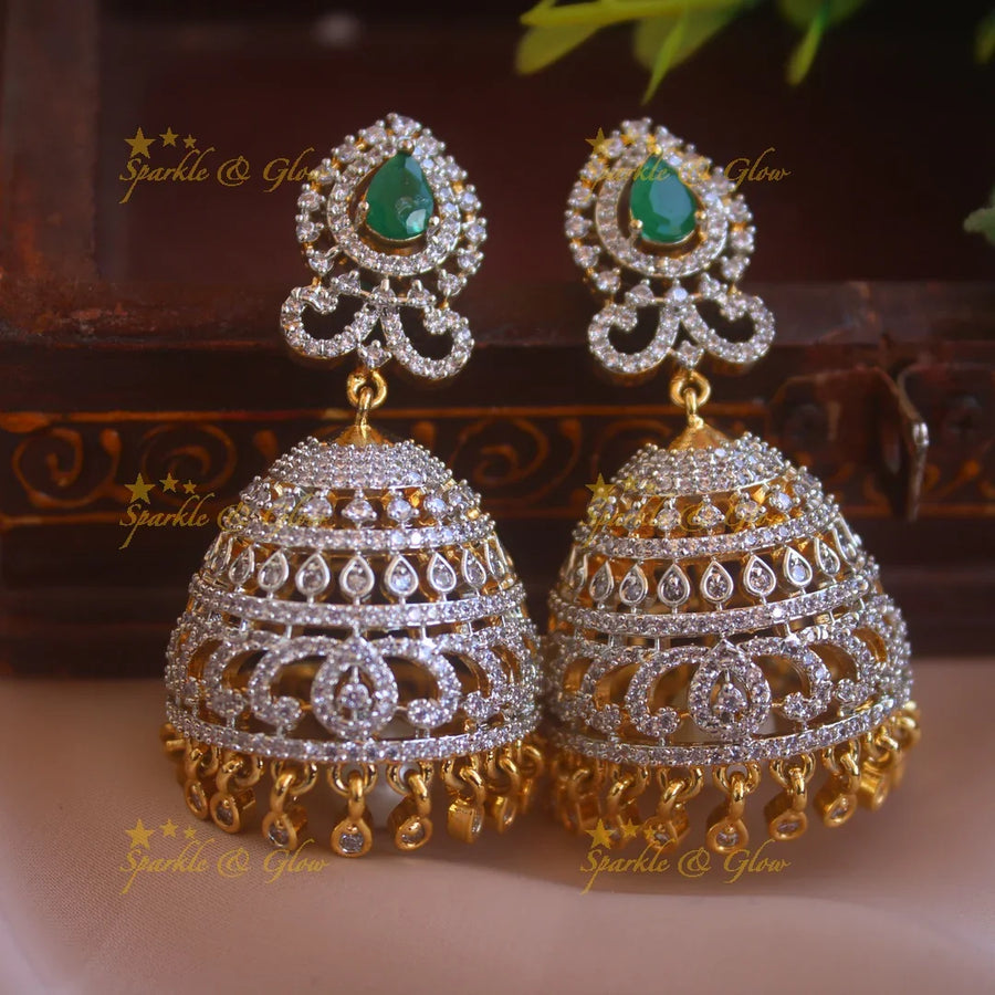 Grand intricate design American diamond jumukas with emerald and stone drops - Sparkle and Glow