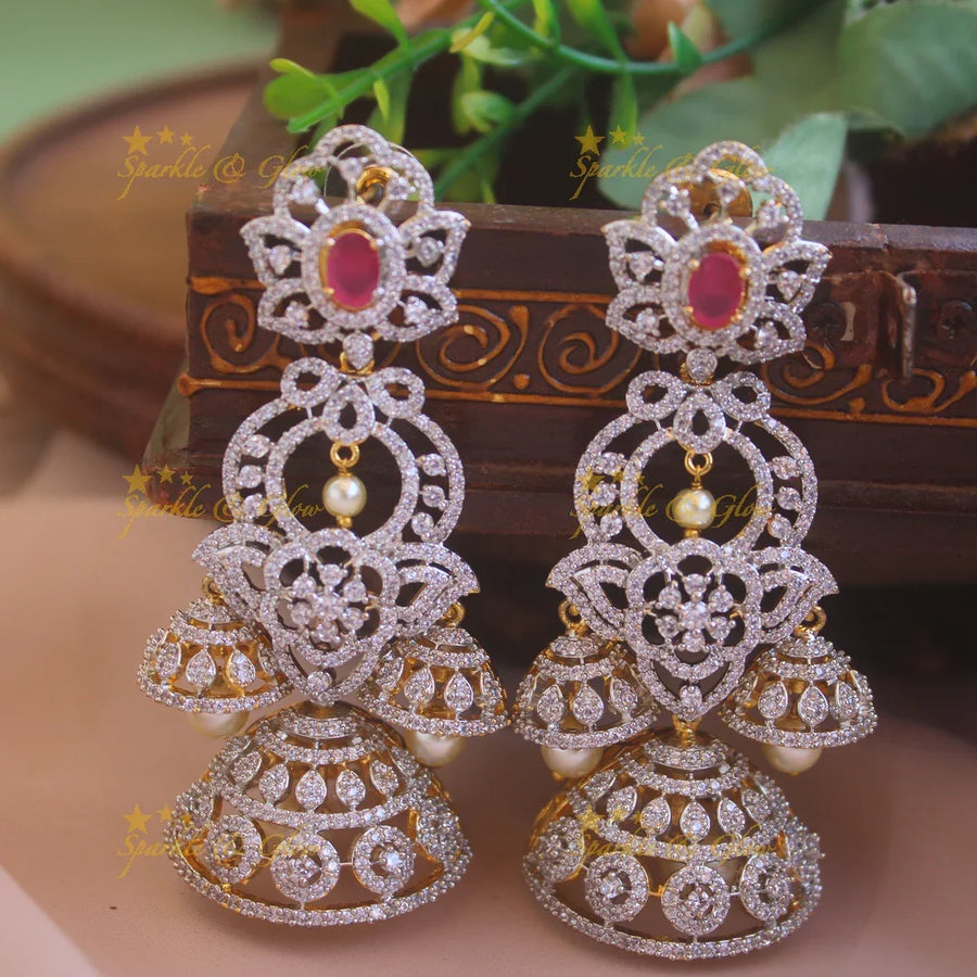 Stunning Floral and leaf design American diamond jumukas with ruby and pearl drops - Sparkle and Glow