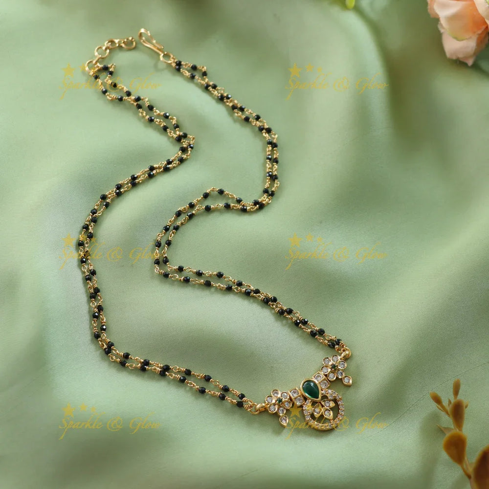 Elegant Floral design stone pendant two layer black beads chain , mangalsutra with emerald - green - Sparkle and Glow