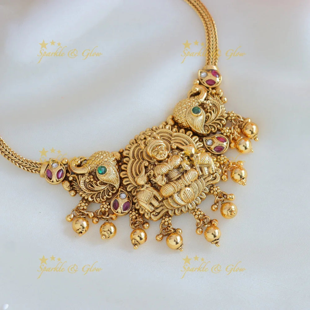 Elegant Idol Lakshmi Elephant Peacock carved choker with gold beads - Sparkle and Glow