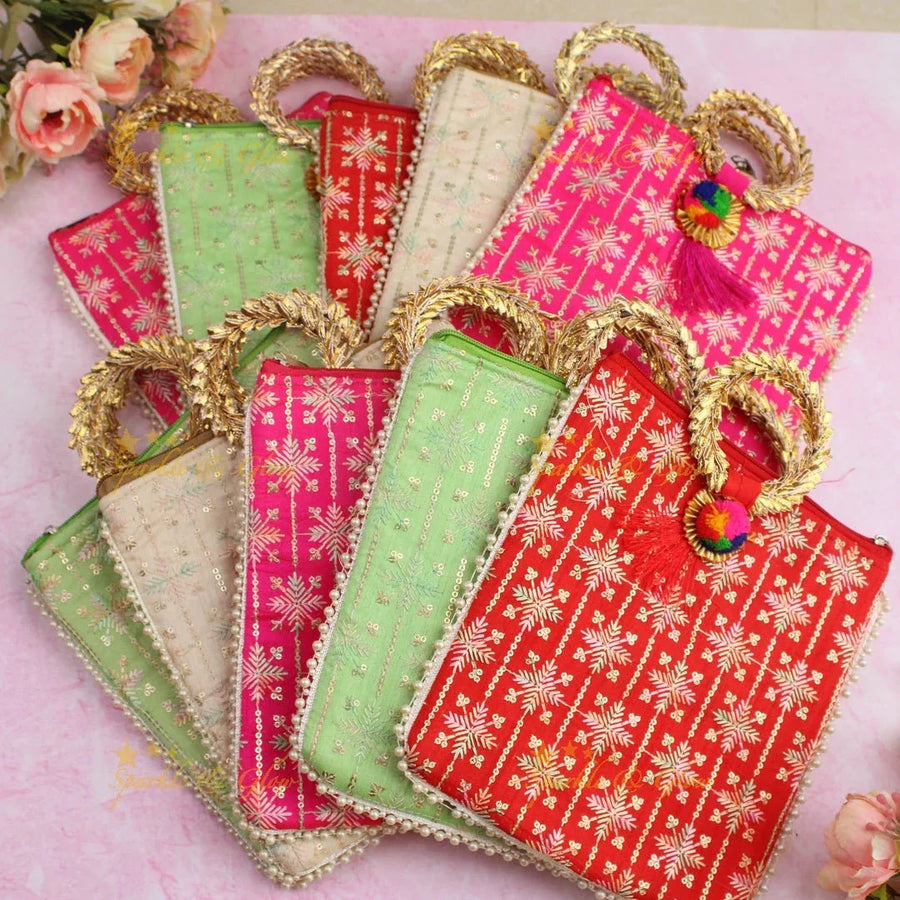 Beautiful leaf design potli bags with gold handle - set of 10 - Assorted colours for return gifts - Sparkle and Glow
