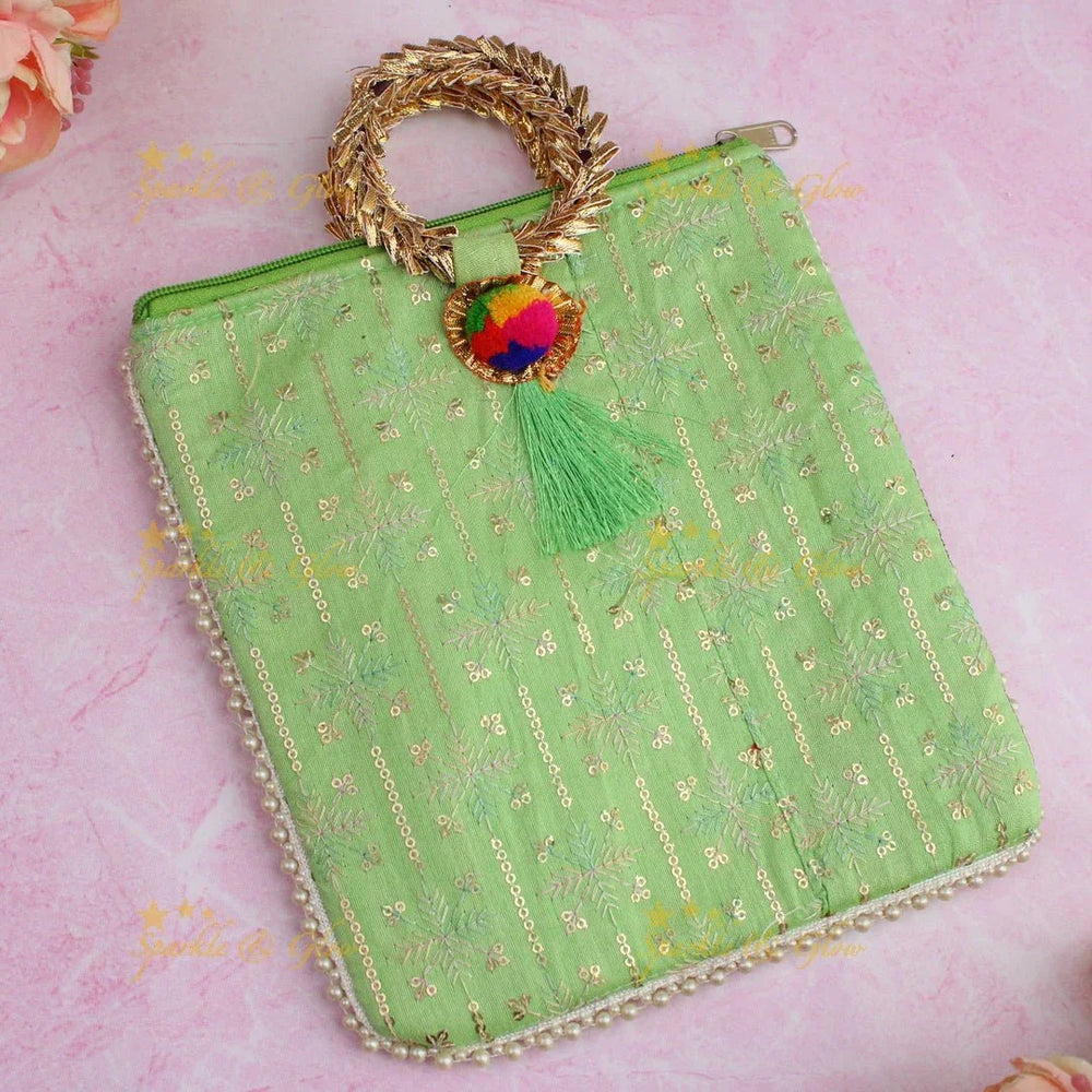 Beautiful leaf design potli bags with gold handle - set of 10 - Assorted colours for return gifts - Sparkle and Glow