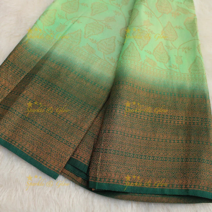 Pretty leaf printed light green with dark green border kubera pattu soft silk saree - Sparkle and Glow