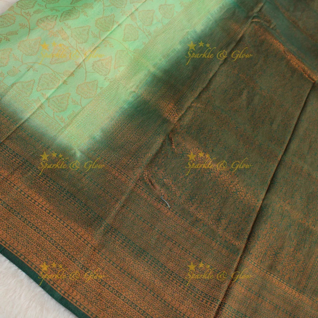 Pretty leaf printed light green with dark green border kubera pattu soft silk saree - Sparkle and Glow