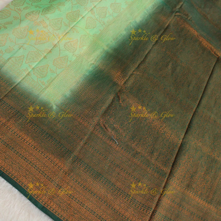 Pretty leaf printed light green with dark green border kubera pattu soft silk saree - Sparkle and Glow