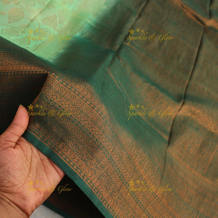 Pretty leaf printed light green with dark green border kubera pattu soft silk saree - Sparkle and Glow