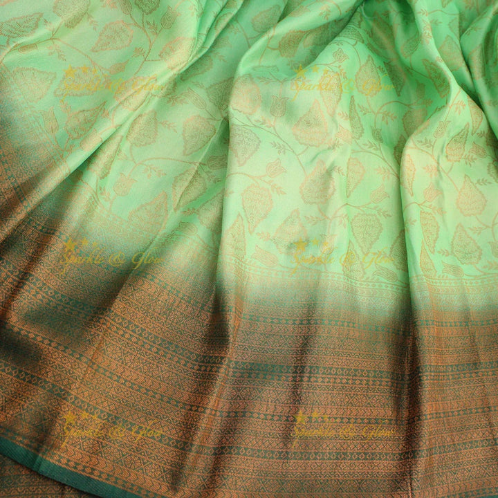Pretty leaf printed light green with dark green border kubera pattu soft silk saree - Sparkle and Glow