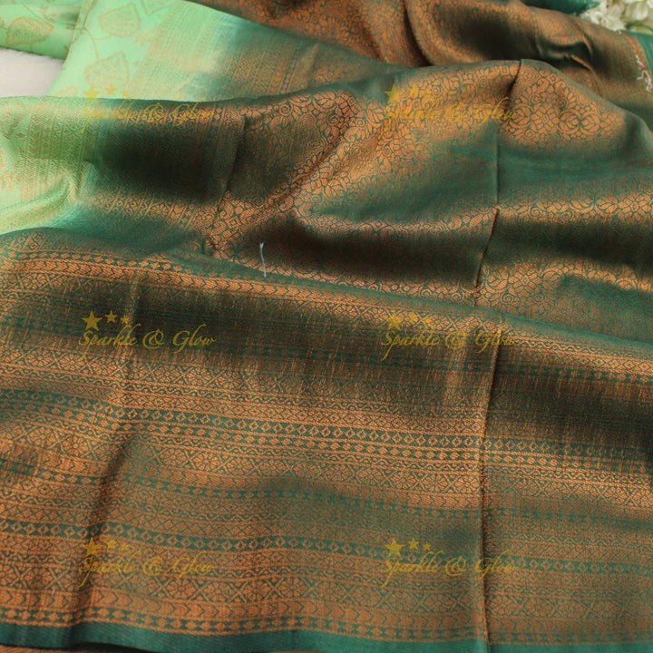 Pretty leaf printed light green with dark green border kubera pattu soft silk saree - Sparkle and Glow