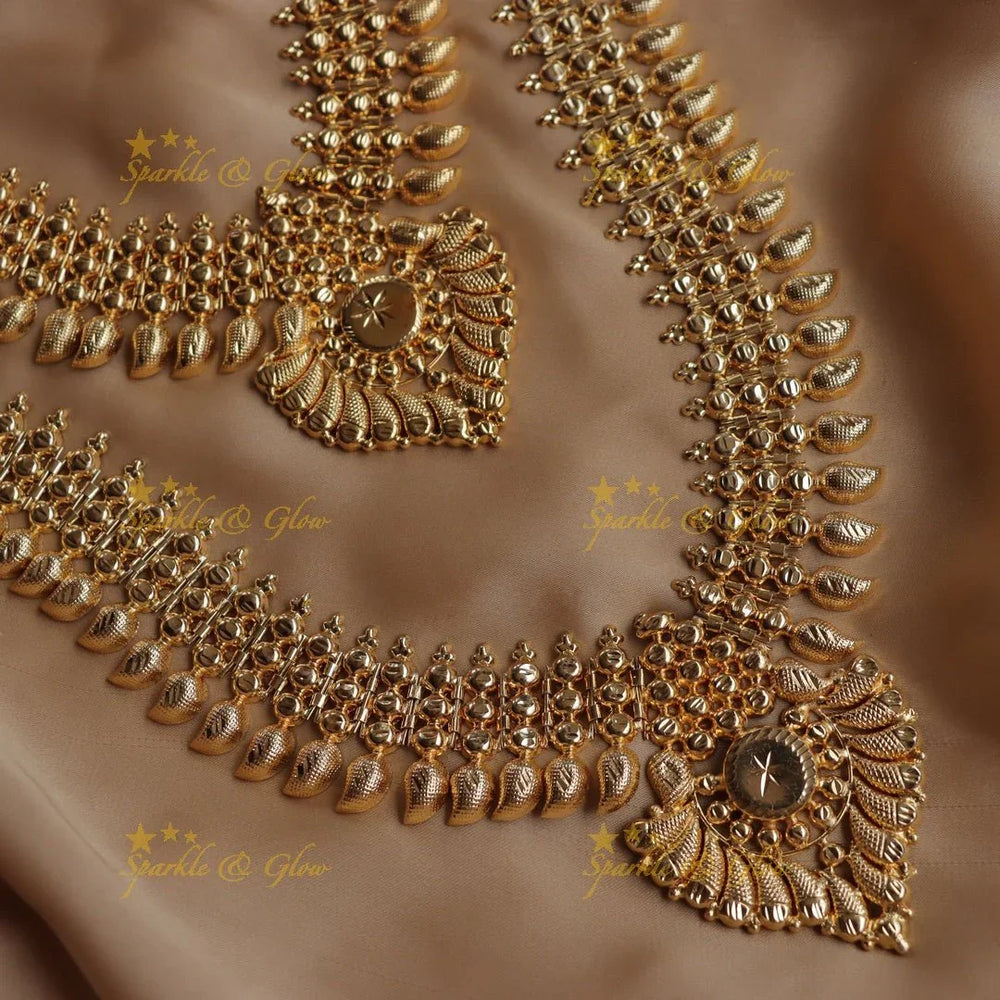 Grand mango design kerala style bridal long and short combo set - Sparkle and Glow