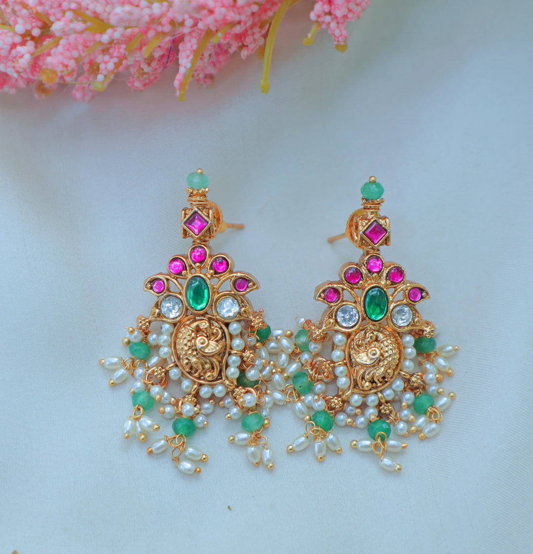 Gracious Jadau Kundan Antique Gold alike Lakshmi Necklace Set with Pink & Green Stone Embellishments - Sparkle and Glow