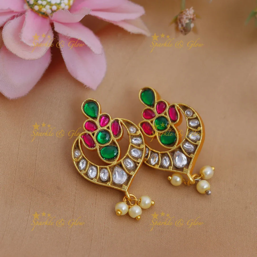 Intricately carved Jadau Kundan Bugadi Earrings with Green-Pink Stones & Kundan Accents - Sparkle and Glow