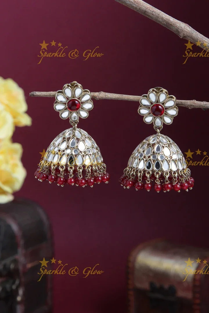 Beautiful Floral Studded Antique Jhumkas - Sparkle and Glow