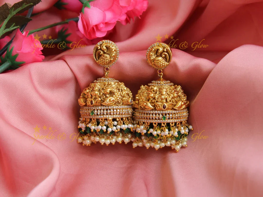 Grand Lakshmi peacock carved gold alike jhumukas with cz stones pearl and green beads - Sparkle and Glow